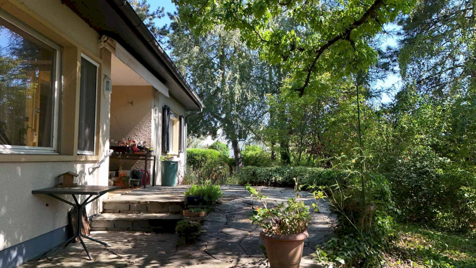 Maison individuelle dans un cadre de verdure