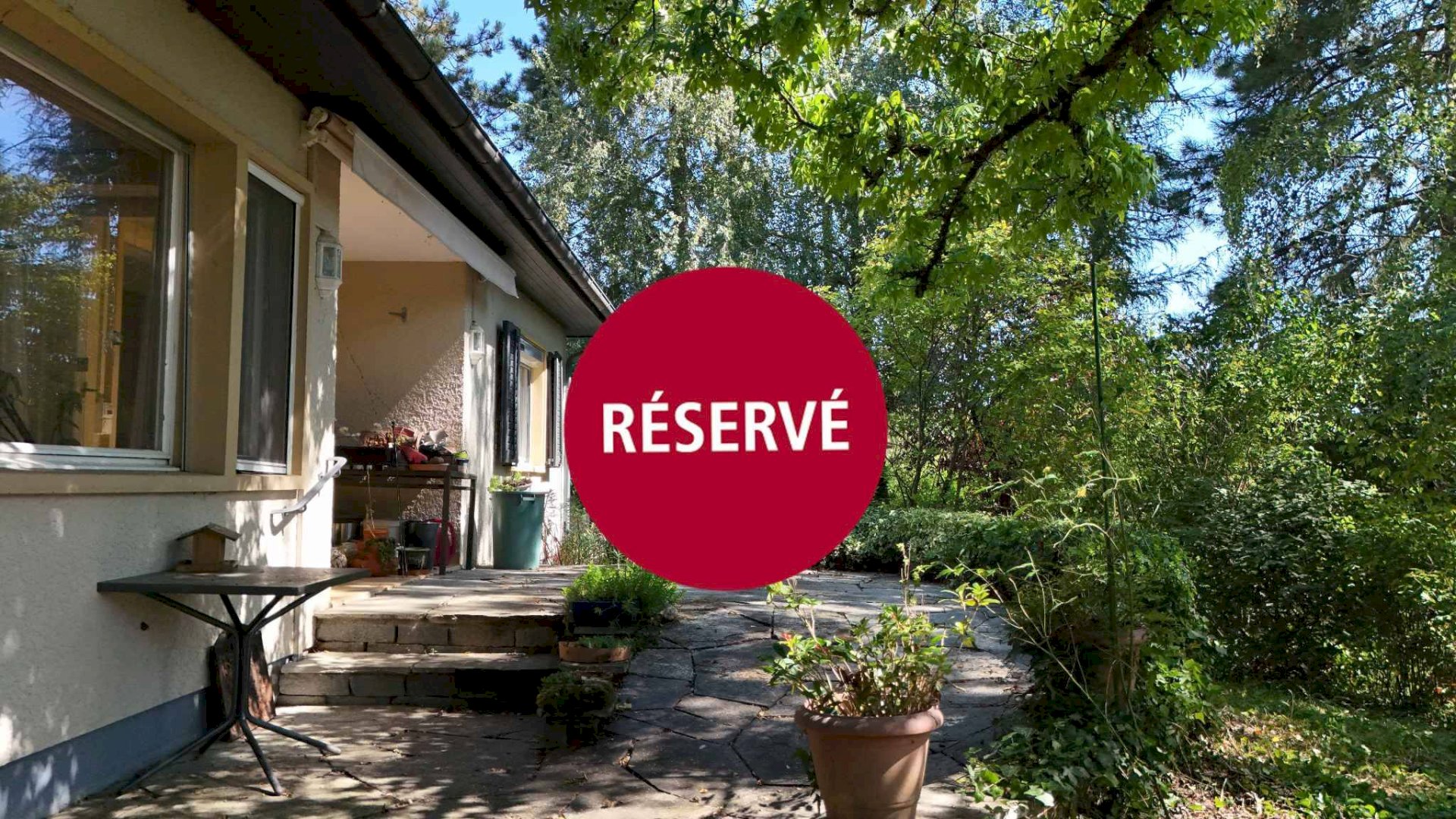 Maison individuelle dans un cadre de verdure